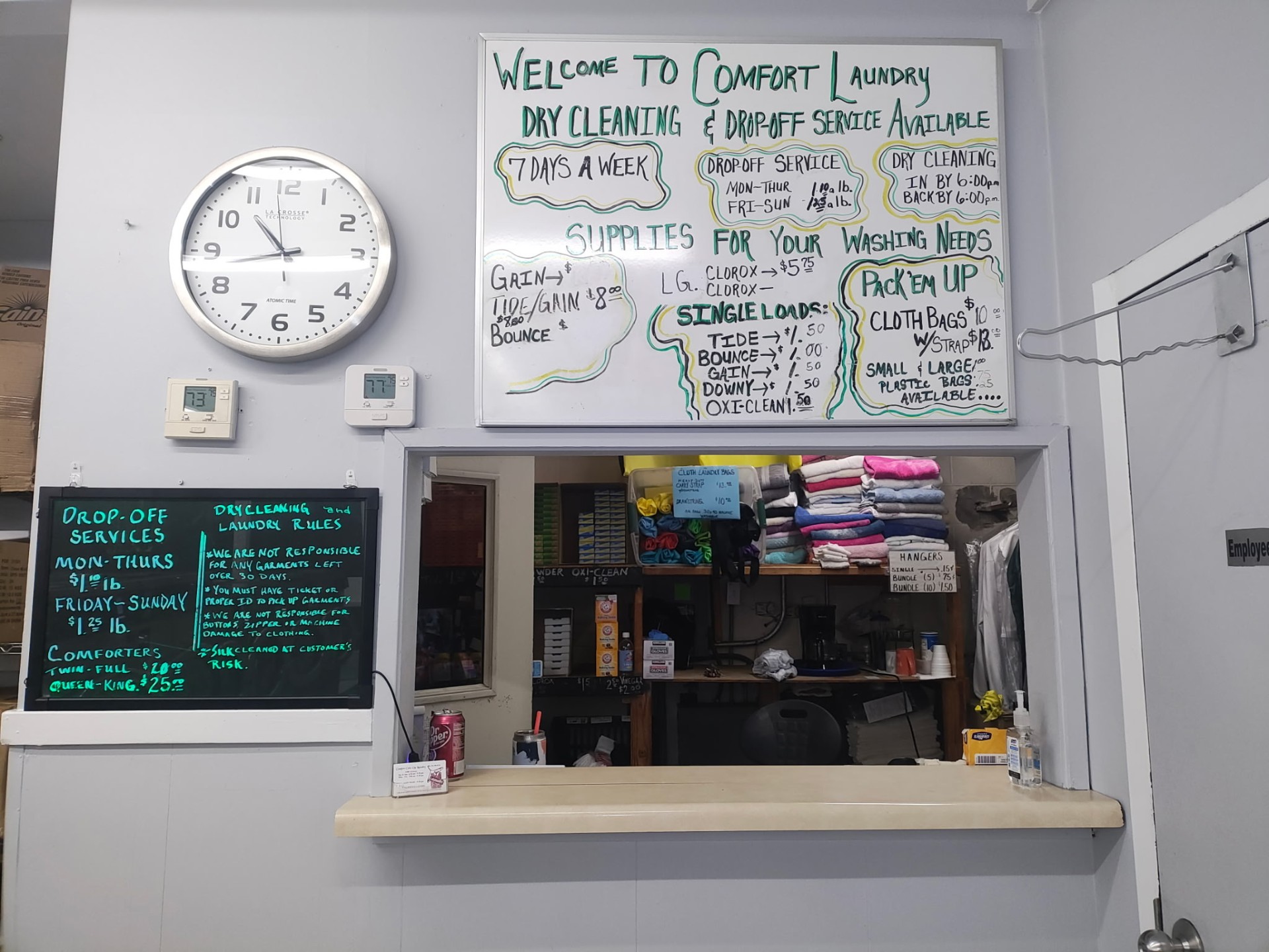 Comfort Laundry drop-off counter and welcome board